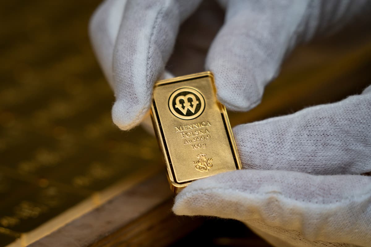 Tether's Gold Ambitions Hit Snag as Key Traders Depart