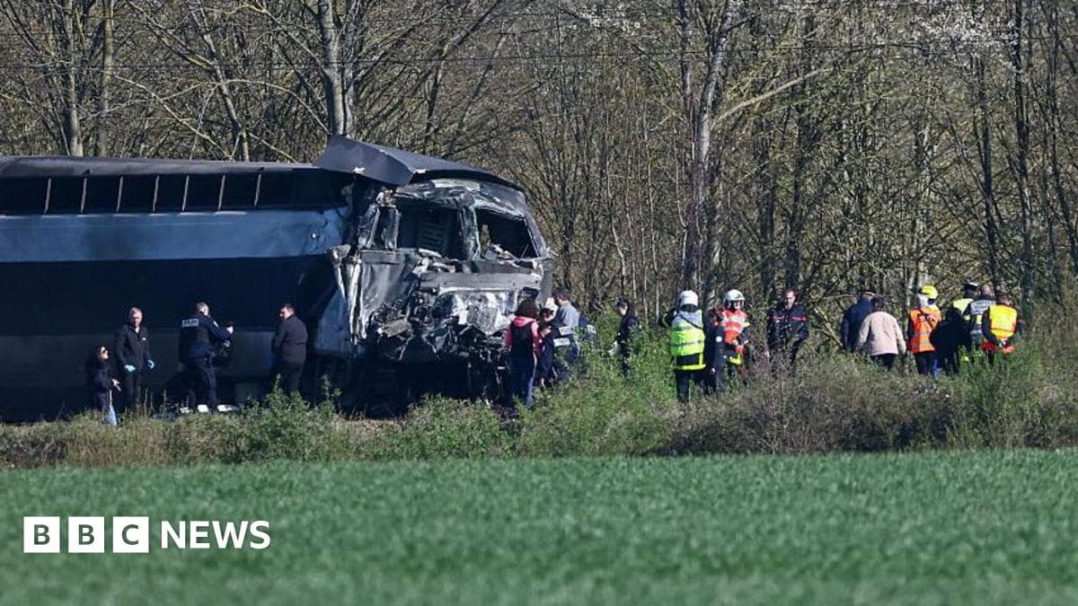 Train collides with lorry carrying military equipment in France
